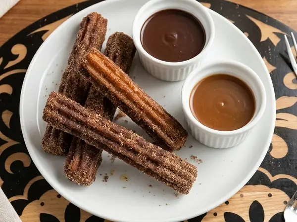 Churros with chocolate and caramel dipping sauces at MEXIKAN in Heritage Valley, Edmonton